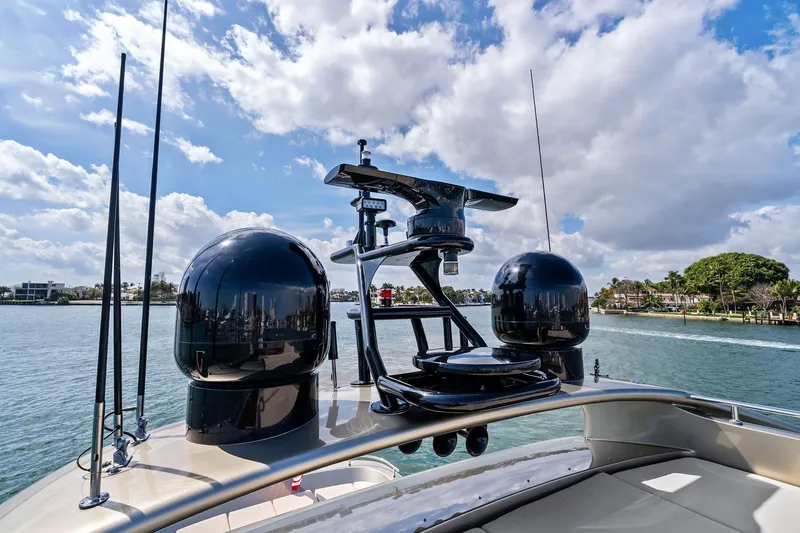 Diamond Yacht Photos Pics 2013 AB 116 Motoryacht radar equipment against a scenic waterfront backdrop.