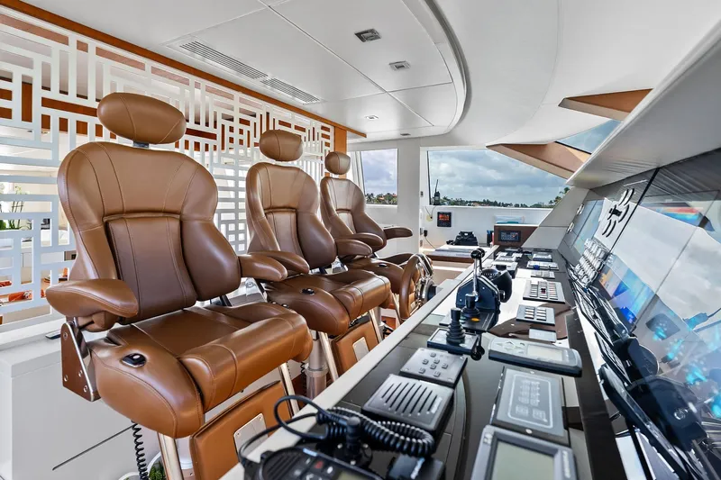 Diamond Yacht Photos Pics Luxurious helm of 2013 AB 116 Motoryacht with leather seats and advanced controls.