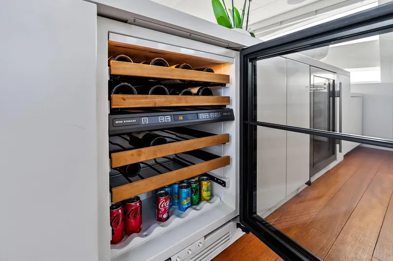 Diamond Yacht Photos Pics Wine cooler with wooden racks and soda cans on AB 116 Motoryacht, 2013 model.