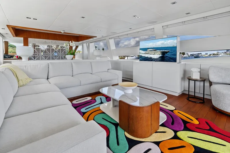 Diamond Yacht Photos Pics Luxurious interior of 2013 AB 116 Motoryacht with modern decor and vibrant rug.