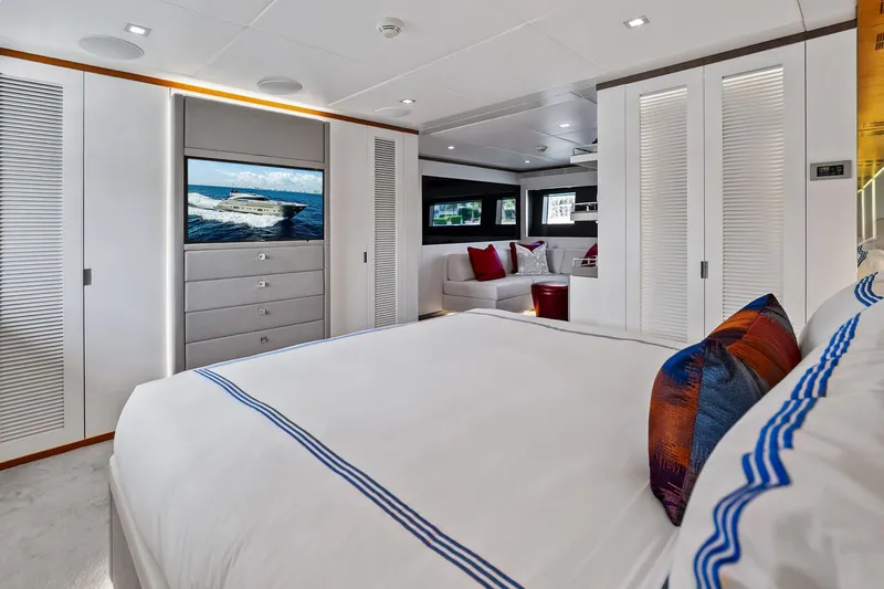 Diamond Yacht Photos Pics Luxurious bedroom interior of 2013 AB 116 Motoryacht with modern decor and elegant furnishings.