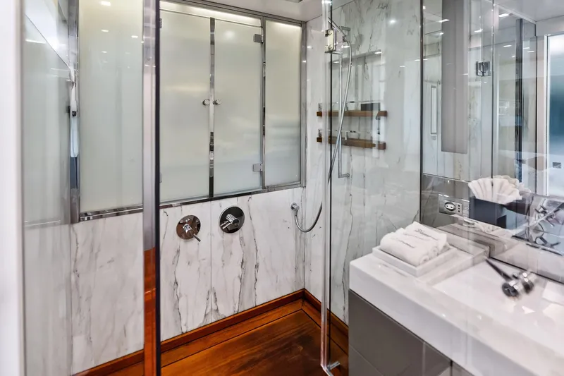Diamond Yacht Photos Pics Luxurious bathroom on 2013 AB 116 Motoryacht with marble and glass shower.