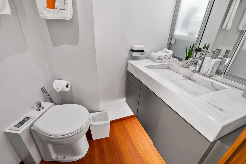 Diamond Yacht Photos Pics Luxurious bathroom on 2013 AB 116 Motoryacht with marble sink and modern fixtures.