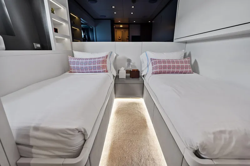 Diamond Yacht Photos Pics Luxurious twin cabin interior on 2013 AB 116 Motoryacht, featuring modern design and ambient lighting.