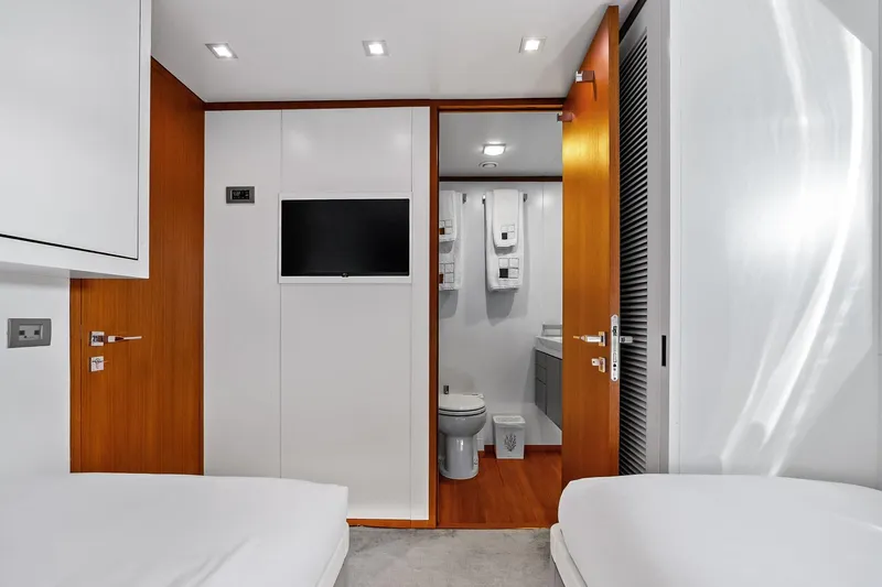 Diamond Yacht Photos Pics Luxurious interior of 2013 AB 116 Motoryacht featuring modern bathroom and cozy bedroom.