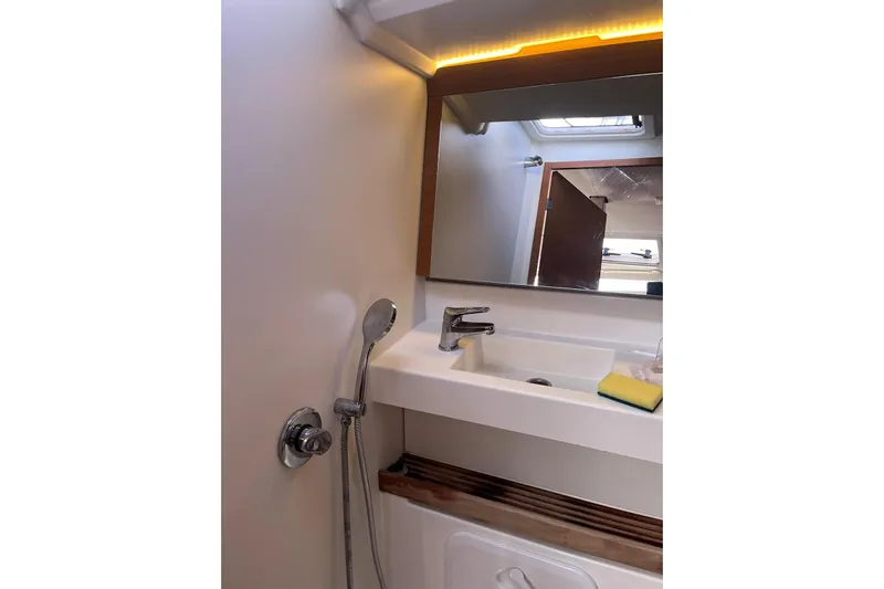 Cicerenella Yacht Photos Pics Bathroom interior of 2019 Jeanneau Sun Odyssey 440 yacht with modern fixtures.