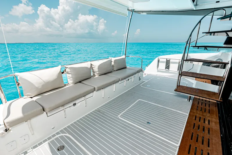 Libert'e Yacht Photos Pics Luxurious 2020 Fountaine Pajot MY6 yacht deck with ocean view and comfortable seating.