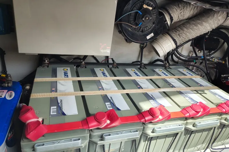 Libert'e Yacht Photos Pics Battery compartment of 2020 Fountaine Pajot MY6 yacht, featuring Varta batteries and ventilation system.