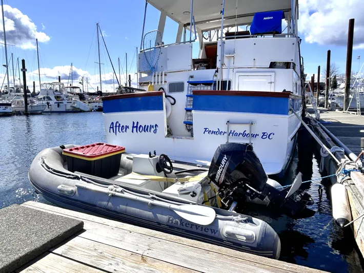  Yacht Photos Pics 1987 Marine Trader 44 Sunbridge Trawler docked with dinghy at Pender Harbour, BC.