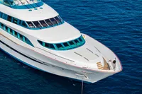 Luxurious 2014 Devonport yacht on clear blue ocean waters.