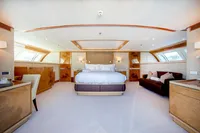 Luxurious yacht bedroom interior with elegant furnishings, Devonport model, 2014.
