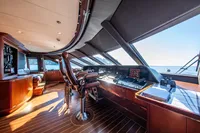 Luxurious yacht helm with leather chairs and panoramic ocean view, Devonport model, 2014.