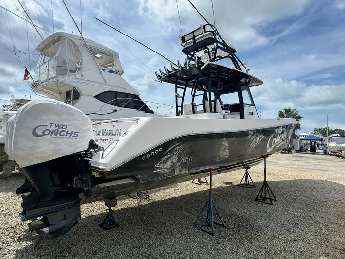  Yacht Photos Pics 2016 Everglades 355 Tournament boat on stands, featuring "Two Conchs" branding.