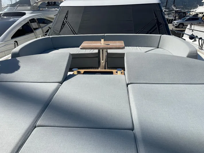  Yacht Photos Pics Luxurious 2022 Cranchi Settantotto 78 yacht with spacious sunbathing area and elegant seating.