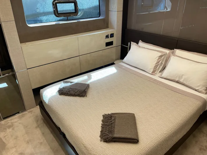  Yacht Photos Pics Luxurious bedroom interior of 2022 Cranchi Settantotto 78 yacht with modern design.