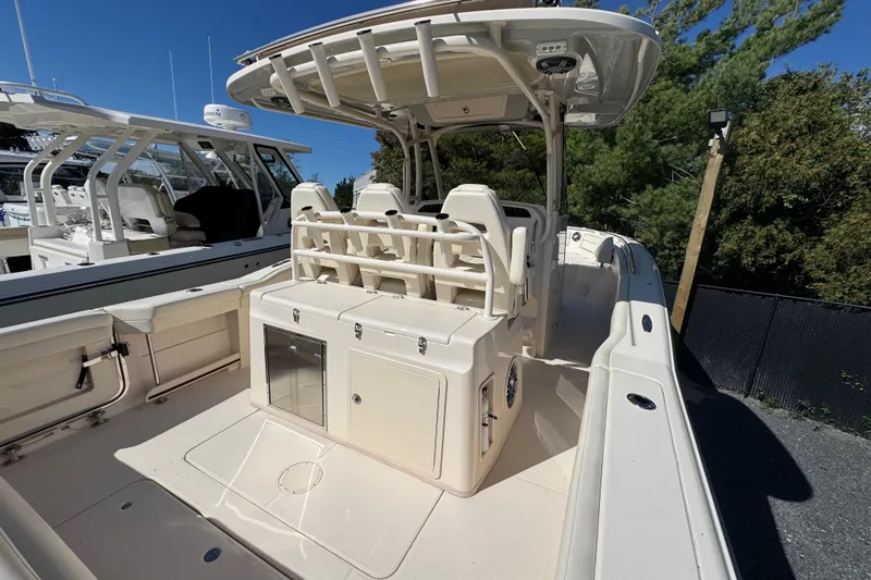  Yacht Photos Pics 2022 Grady-White Canyon 326 boat interior with seating and storage compartments.