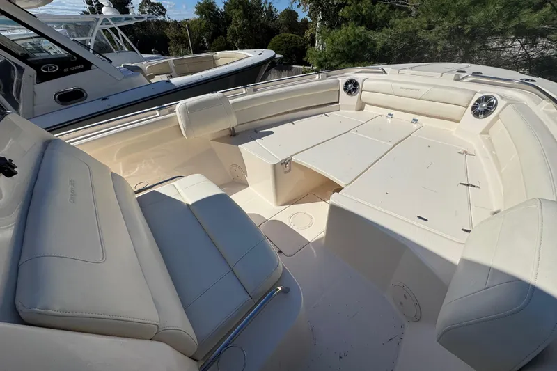  Yacht Photos Pics 2022 Grady-White Canyon 326 boat interior with spacious seating and modern design.