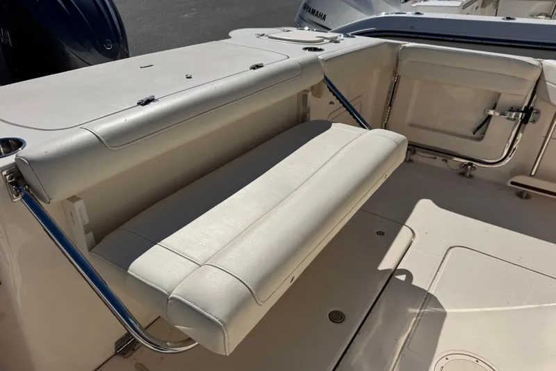  Yacht Photos Pics 2022 Grady-White Canyon 326 boat with foldable seating and Yamaha engine.