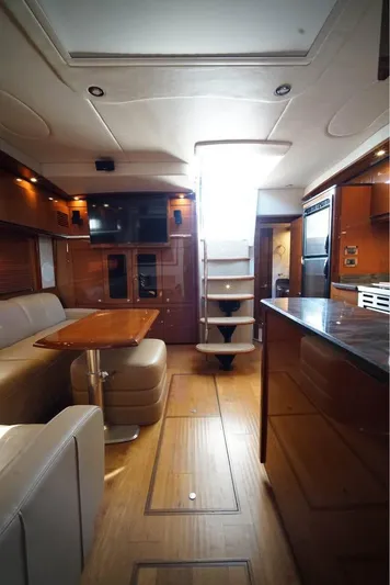  Yacht Photos Pics Luxurious interior of 2012 Sea Ray 500 Sundancer yacht with modern amenities and elegant design.
