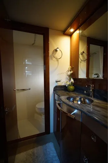  Yacht Photos Pics Luxurious bathroom in 2012 Sea Ray 500 Sundancer yacht with elegant fixtures and modern design.