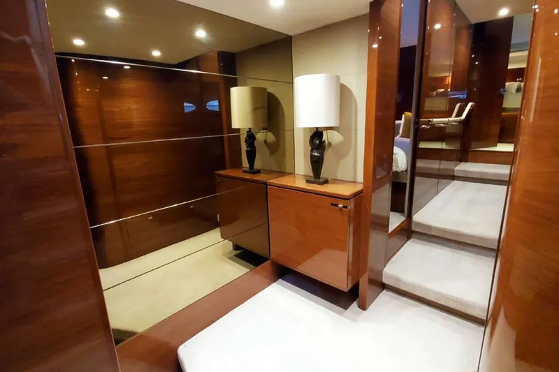  Yacht Photos Pics Luxurious interior of 2014 Princess 82 yacht with elegant wood paneling and modern decor.