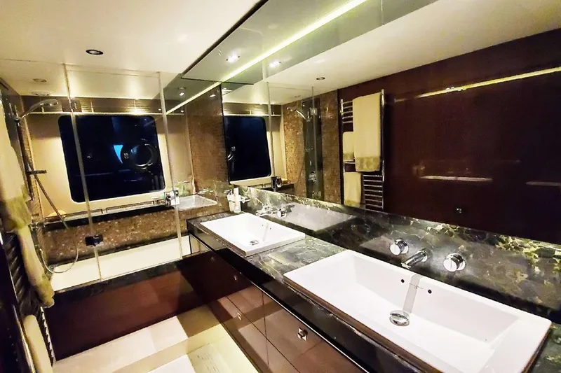  Yacht Photos Pics Luxurious bathroom on 2014 Princess 82 yacht with dual sinks and elegant design.
