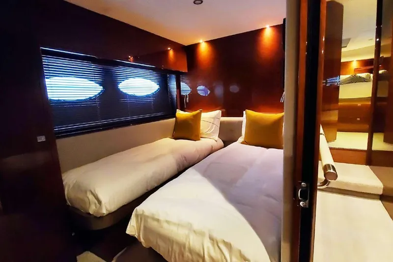  Yacht Photos Pics Luxurious cabin interior of 2014 Princess 82 yacht with twin beds and elegant decor.