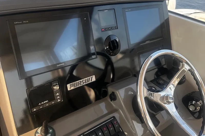  Yacht Photos Pics 2018 Pursuit OS 355 Offshore helm with dual displays and steering wheel.