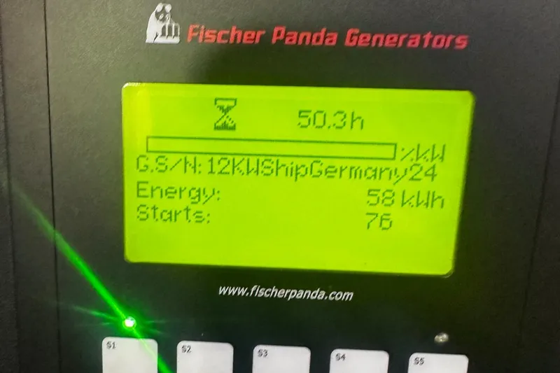  Yacht Photos Pics Fischer Panda generator display showing 50.3 hours, 58 kWh energy, 76 starts.