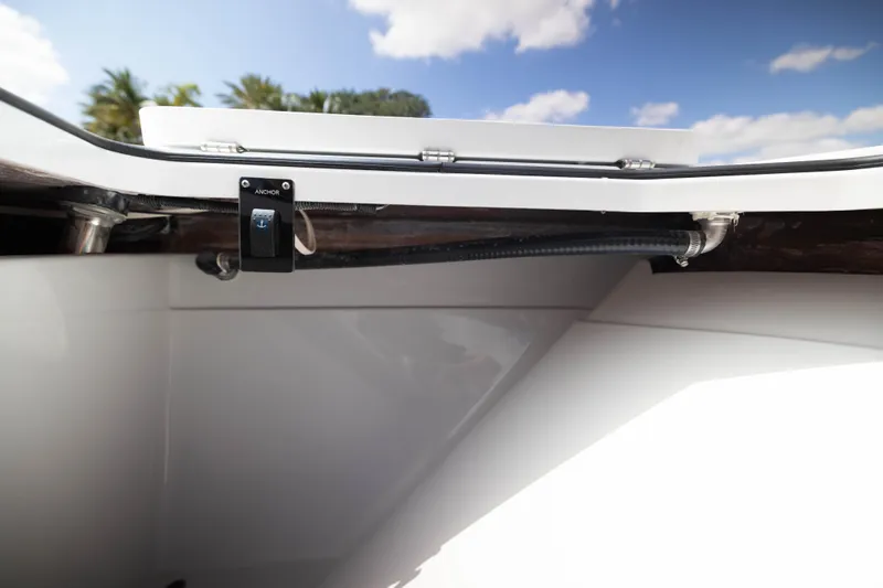  Yacht Photos Pics Anchor control switch on Freeman 47 LX boat, 2026 model, under clear blue sky.