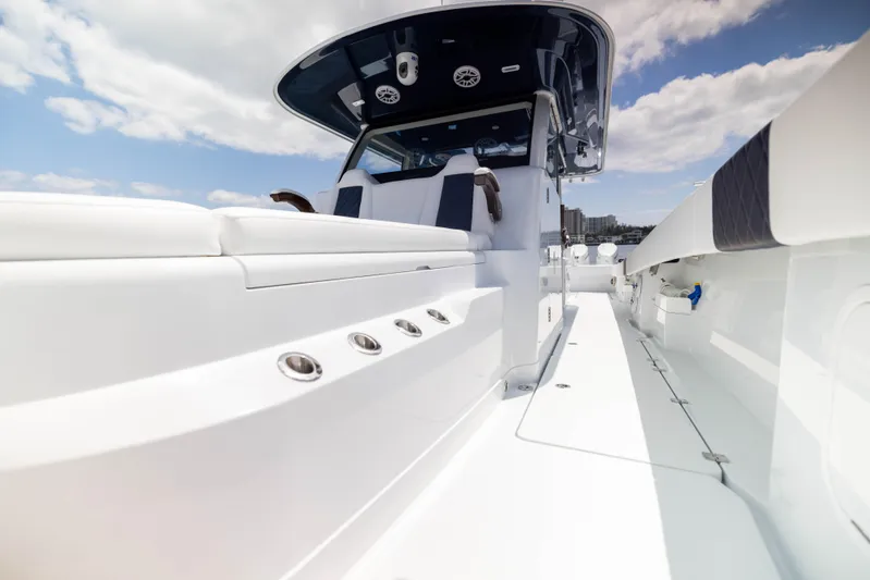  Yacht Photos Pics 2026 Freeman 47 LX boat interior with sleek white design and modern features.