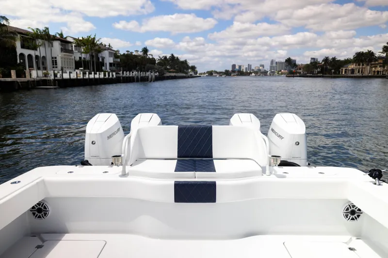  Yacht Photos Pics Freeman 47 LX 2026 boat with Mercury engines on a scenic waterway.