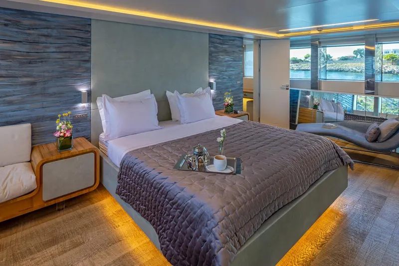 Mondomarine 138' Yacht Photos Pics Luxurious Mondomarine 138 yacht bedroom, 2008 model, featuring elegant decor and scenic window views.