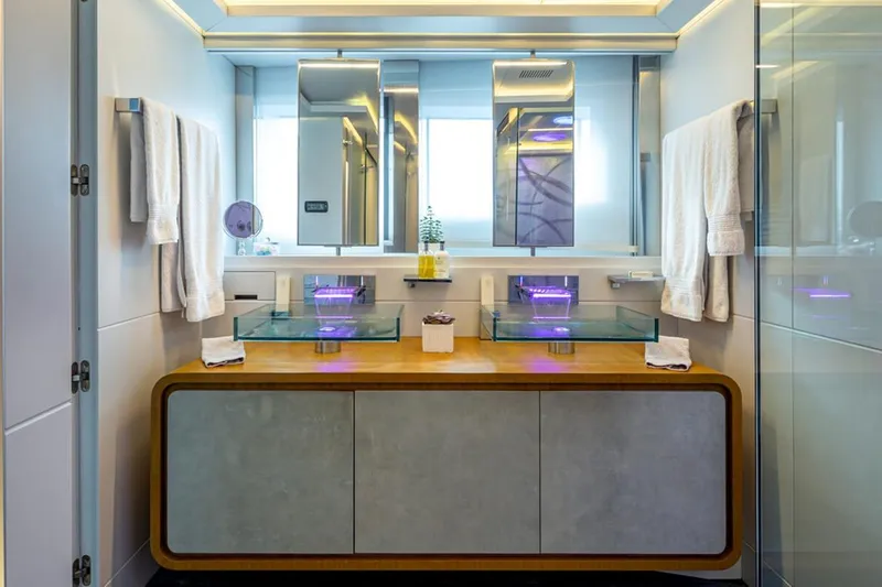 Mondomarine 138' Yacht Photos Pics Luxurious Mondomarine 138 yacht bathroom with modern glass sinks and elegant lighting, 2008 model.