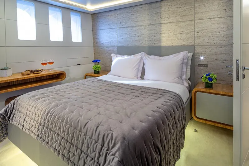 Mondomarine 138' Yacht Photos Pics Luxurious Mondomarine 138 yacht bedroom, 2008 model, featuring elegant decor and cozy bedding.