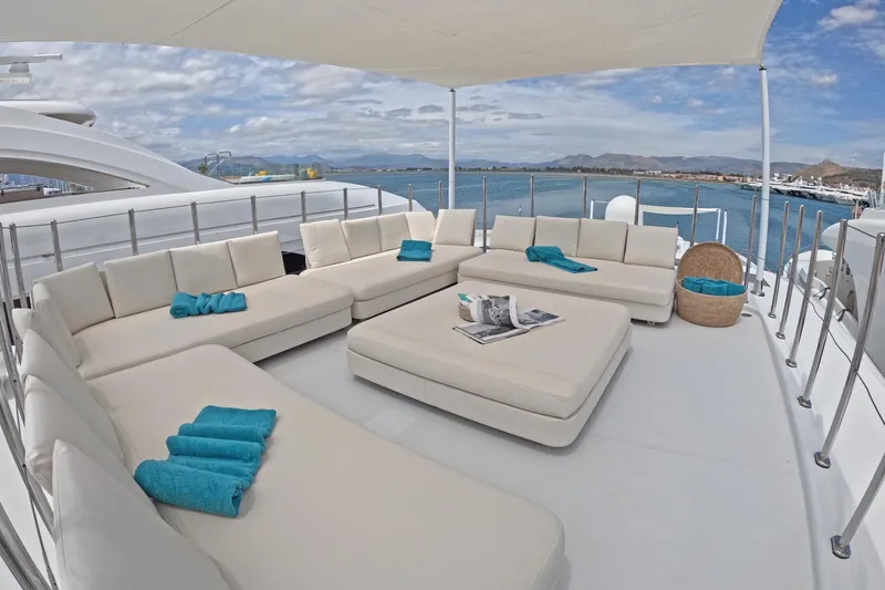 Mondomarine 138' Yacht Photos Pics Luxurious Mondomarine 138 yacht deck with plush seating, turquoise towels, and ocean view, 2008 model.