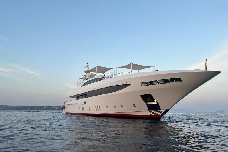 Mondomarine 138' Yacht Photos Pics Luxurious 2008 Mondomarine 138 yacht on serene ocean waters at sunset.