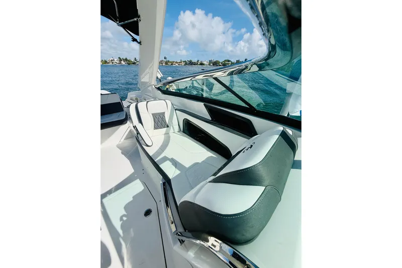  Yacht Photos Pics 2020 Monterey 328SS Super Sport boat interior with luxurious seating and scenic water view.