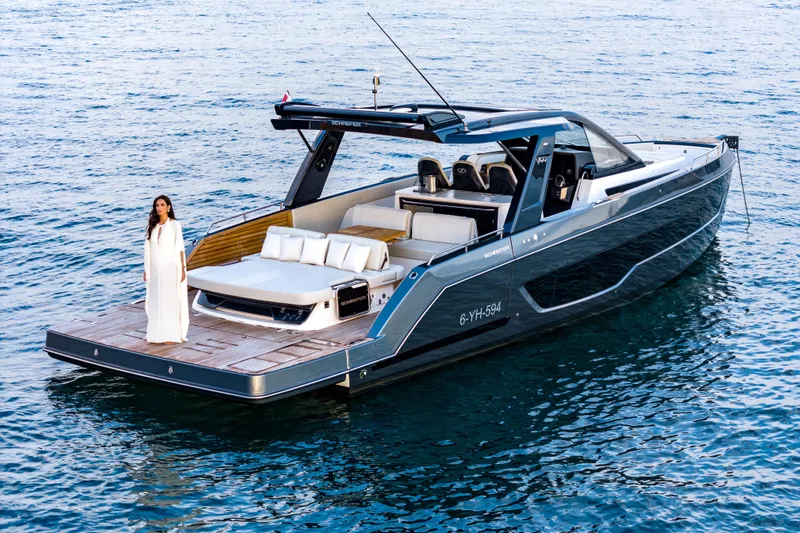  Yacht Photos Pics Luxury Schaefer V44 yacht 2025 on water, featuring elegant design and spacious deck.