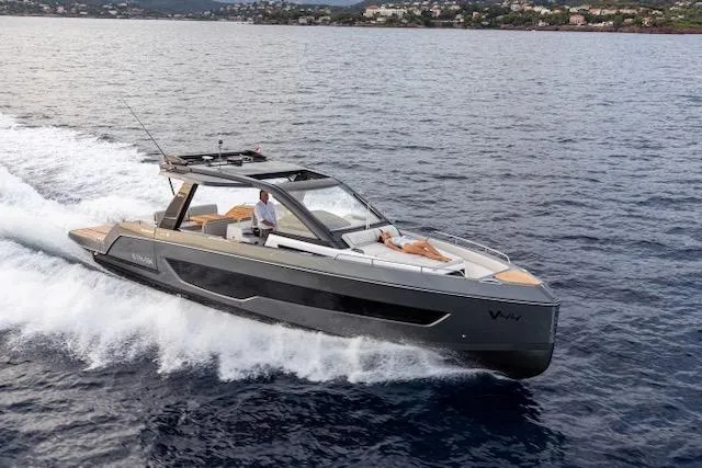  Yacht Photos Pics Schaefer V44 yacht cruising on open water, 2025 model, sleek design.