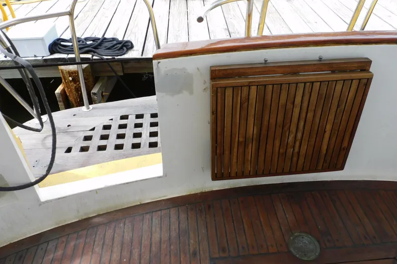 Popeye Yacht Photos Pics 1988 Hans Christian 45 Independence Trawler deck with wooden details and dock view.