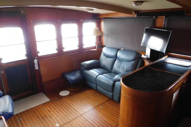 Popeye Yacht Photos Pics Interior of 1988 Hans Christian 45 Independence Trawler with leather seating and wood flooring.