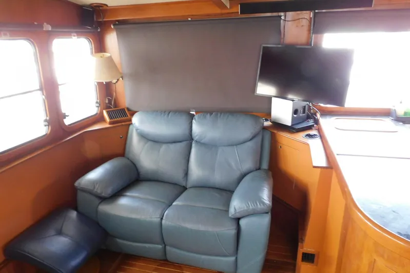 Popeye Yacht Photos Pics Interior of 1988 Hans Christian 45 Independence Trawler with leather seating and TV.