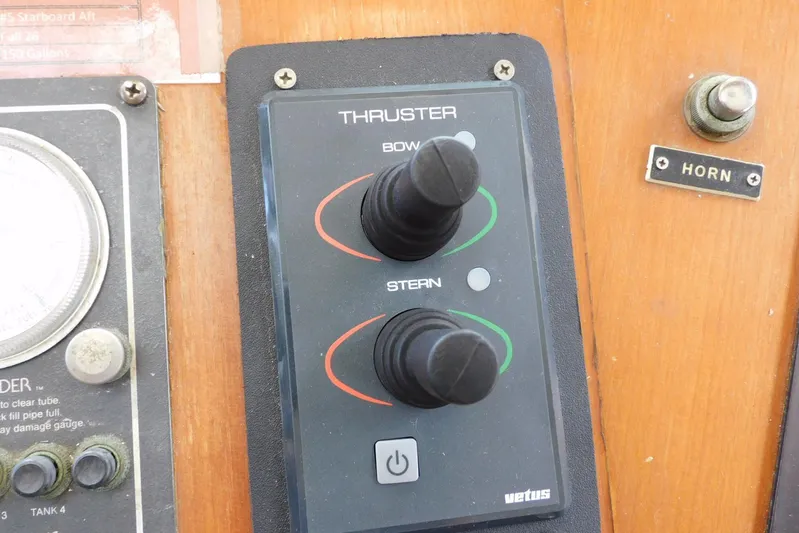 Popeye Yacht Photos Pics Control panel of 1988 Hans Christian 45 Independence Trawler with thruster and horn switches.