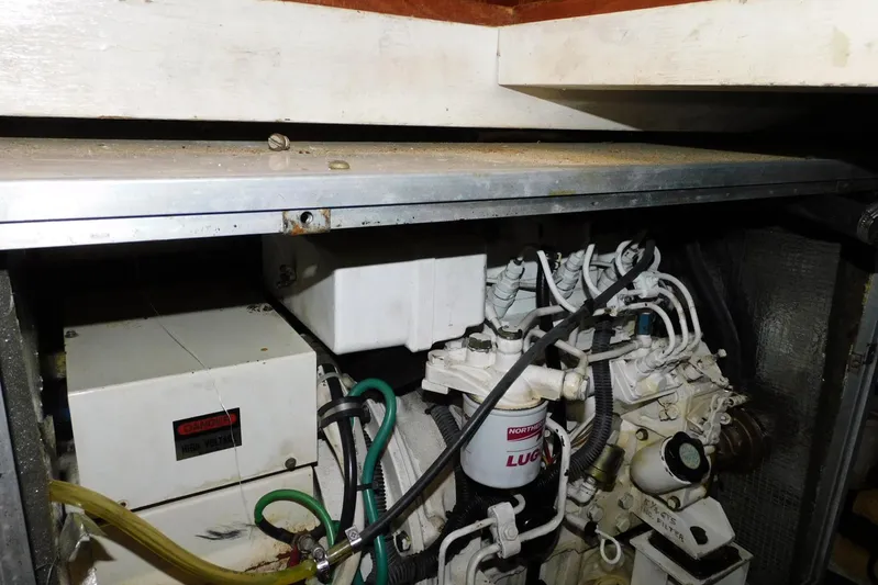 Popeye Yacht Photos Pics Engine compartment of 1988 Hans Christian 45 Independence Trawler, showcasing mechanical components.