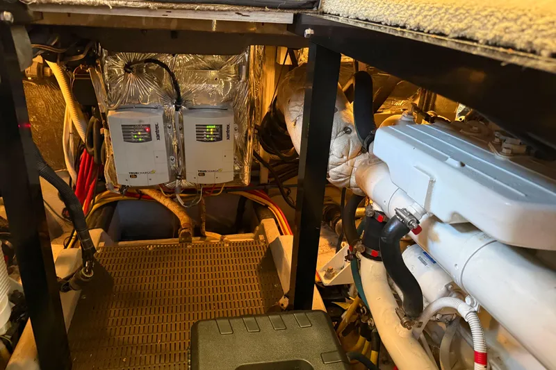 Y-knot Yacht Photos Pics Engine room of 2007 Meridian 459 Motoryacht with electrical components and wiring.