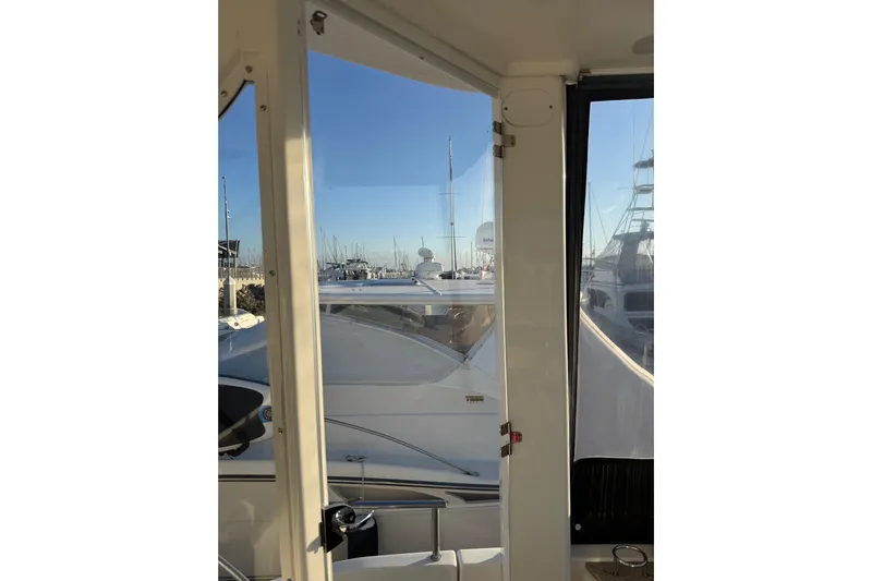 Y-knot Yacht Photos Pics 2007 Meridian 459 Motoryacht view from interior, overlooking marina.