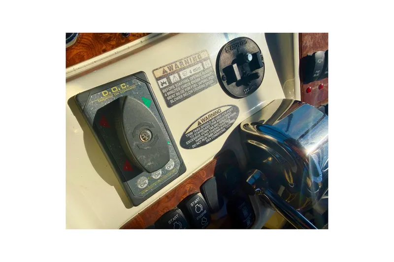 Y-knot Yacht Photos Pics Control panel of 2007 Meridian 459 Motoryacht with various switches and warnings.