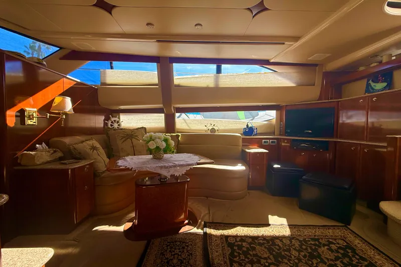 Y-knot Yacht Photos Pics Luxurious 2007 Meridian 459 Motoryacht interior with elegant seating and decor.