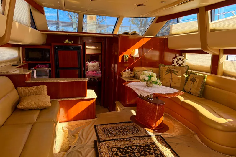 Y-knot Yacht Photos Pics Luxurious interior of a 2007 Meridian 459 Motoryacht with elegant furnishings and decor.
